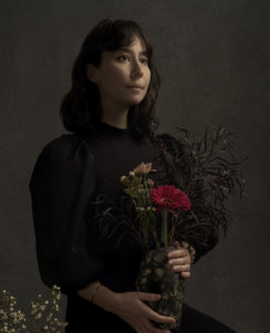 Alexis holding flowers