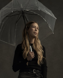 Jen holding umbrella