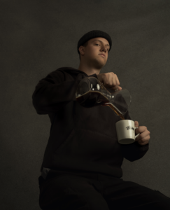 Evan pouring himself some coffee