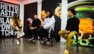 Three authors of Black Power Kitchen sitting on stools in gallery giving interview with moderator