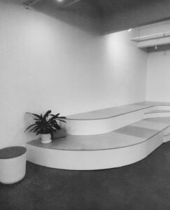Stadium leveled seating in gallery