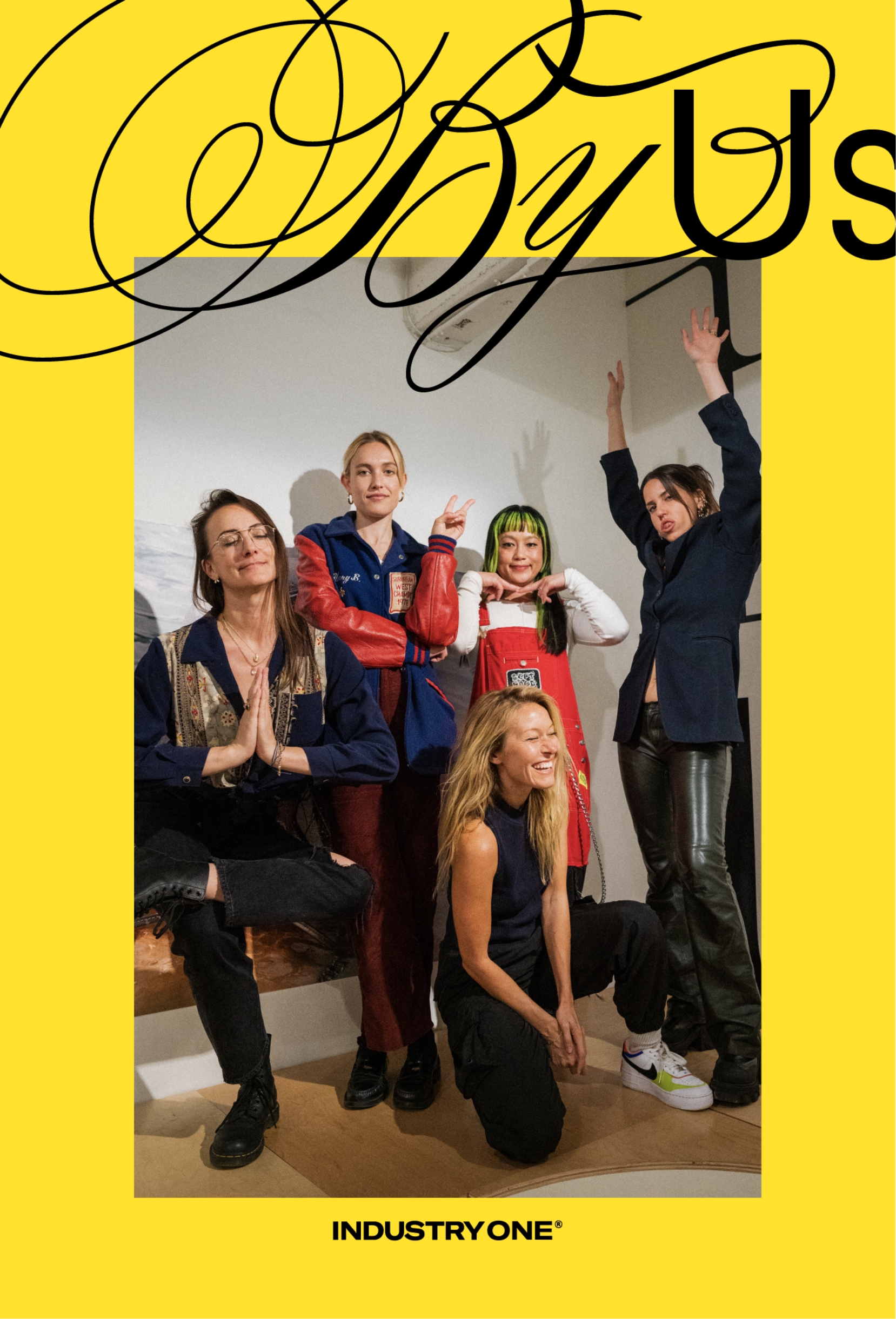 Amber, Carlotta, Christine and Natalie posing together in gallery. image framed by title above reading By Us in script font and Industry One logo below.
