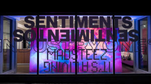outside gallery window of Industry One's Sentiments show