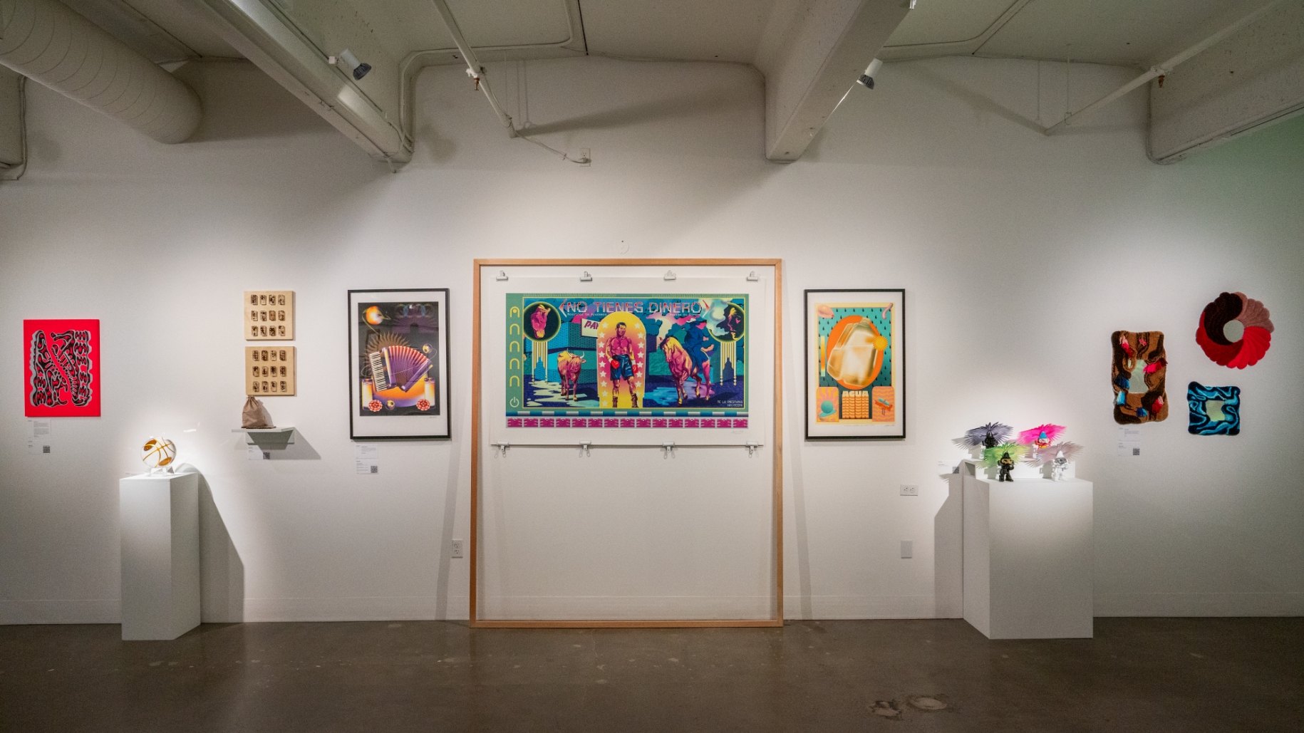 An art gallery with a variety of art on display.