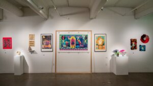 An art gallery with a variety of art on display.