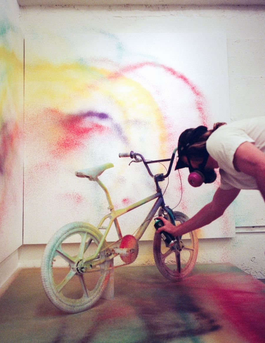 MadSteez spray paints BMX bike
